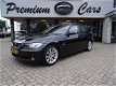 BMW 3-serie Touring - 318i High Executive, M-uitvoering, Leer, NAV groot, Trekh, Xenon, Carbonzwart - 1 - Thumbnail