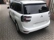 Citroën Grand C4 Picasso - 1.2 PureTech Intensive met lichte linkervoorschade - 1 - Thumbnail