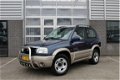 Suzuki Grand Vitara - 2.0i 4X4 Airco N.A.P. Trekhaak - 1 - Thumbnail