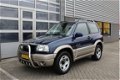 Suzuki Grand Vitara - 2.0i 4X4 Airco N.A.P. Trekhaak - 1 - Thumbnail