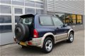 Suzuki Grand Vitara - 2.0i 4X4 Airco N.A.P. Trekhaak - 1 - Thumbnail