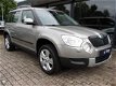 Skoda Yeti - 1.2 TSI Ambition 1ste eigenaar 115 DKM - 1 - Thumbnail