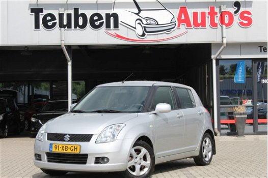 Suzuki Swift - 1.3 Exclusive airco, radio cd speler, elektrische ramen, trekhaak, lichtmetalen wiele - 1