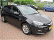 Opel Astra Sports Tourer - 1.4 Turbo Sport +AUTOMAAT*AIRCO(ECC)*NAVIGATIE*CRUISE CONTROL* ACHTERUITR - 1 - Thumbnail