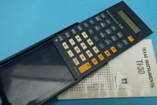TEXAS INSTRUMENTS TI 30 - vintage calculator  met gebruiksaanwijzing