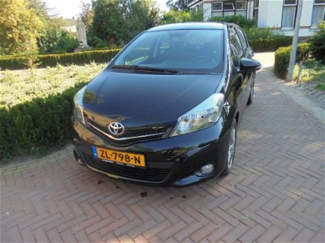 Toyota Yaris - 1.3 16v 99pk 5drs Dynamic Sport Navi, spec. sinds 1968 - 1