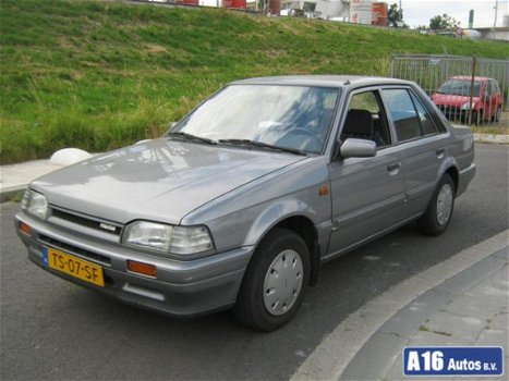 Mazda 323 - 323 SEDAN 1.3 ENVOY K6 - 1