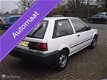 Nissan Sunny - 1.4 Automaat 60000 Km Aangepast voor invalide - 1 - Thumbnail