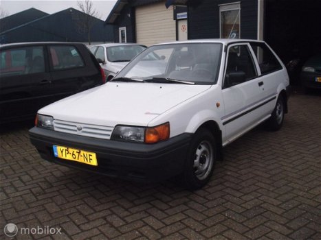 Nissan Sunny - 1.4 Automaat 60000 Km Aangepast voor invalide - 1