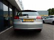 Opel Insignia Sports Tourer - 1.8 Edition - 1 - Thumbnail