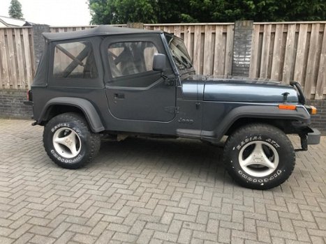 Jeep Wrangler - 2.5i Hardtop SOFTTOP EN HARDTOP - 1