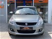 Suzuki Swift - 1.2 Exclusive EASSS Clima Cruise 5-Deurs LM - 1 - Thumbnail