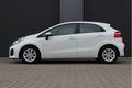 Kia Rio - 1.2 CVVT ComfortLine | Airco | Trekhaak | Fabrieksgarantie | - 1 - Thumbnail