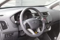 Kia Rio - 1.2 CVVT ComfortLine | Airco | Trekhaak | Fabrieksgarantie | - 1 - Thumbnail