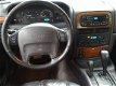 Jeep Grand Cherokee - 4.0i Limited Automaat Airco Climate control Leer Trekhaak - 1 - Thumbnail