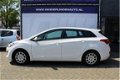 Hyundai i30 Wagon - 1.4 Airco, cruise, stoelverwarming - 1 - Thumbnail
