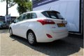 Hyundai i30 Wagon - 1.4 Airco, cruise, stoelverwarming - 1 - Thumbnail