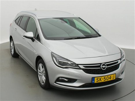 Opel Astra - ST Online Edition 1.4T 150PK NAVI/CLIMA/AGR/PDC - 1