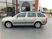 Skoda Octavia Combi - 1.6 Ambiente AUTOMAAT NAVI - 1 - Thumbnail