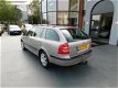 Skoda Octavia Combi - 1.6 Ambiente AUTOMAAT NAVI - 1 - Thumbnail