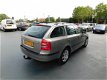 Skoda Octavia Combi - 1.6 Ambiente AUTOMAAT NAVI - 1 - Thumbnail