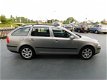 Skoda Octavia Combi - 1.6 Ambiente AUTOMAAT NAVI - 1 - Thumbnail