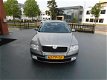 Skoda Octavia Combi - 1.6 Ambiente AUTOMAAT NAVI - 1 - Thumbnail