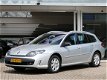 Renault Laguna Estate - 1.5 dCi Dynamique, navigatie, parkeersensoren, half leer - 1 - Thumbnail