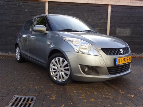 Suzuki Swift - 1.2 Exclusive EASSS Clima/Cruisecontrol/LM/ APK 30-9-2020 - 1