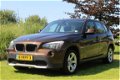 BMW X1 - S DRIVE 1.8I *Cruise control, Climate control, Navi, Park. sensoren, Trekhaak - 1 - Thumbnail