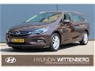 Opel Astra Sports Tourer - 1.0 Online Edition 105pk | Navigatie | Parkeersensoren | Cruise control | - 1 - Thumbnail