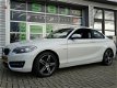 BMW 2-serie Coupé - 218d M Sport airco cruise navi * 88.697 km - 1 - Thumbnail