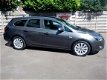 Opel Astra Sports Tourer - 1.7 CDTi Cosmo 110pk Navi. Xenon - 1 - Thumbnail