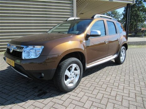 Dacia Duster - 1.6 Lauréate 2wd [ airco, audio, lmv, trekhaak, pdc ] - 1