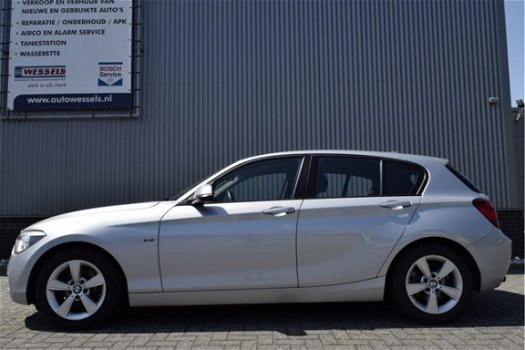 BMW 1-serie - 116d Executive navi prof, sportstoelen, afn. trekhaak, cruise control, climate, PDC - 1