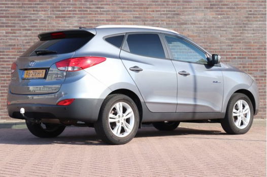 Hyundai ix35 - 1.6i GDi Business Edition | Navigatie | Climate control | Cruise control | Achteruitr - 1