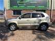 Hyundai Tucson - 2.0i Style Airco-ECC Trekh. LAGE KMSTAND NL-Auto NIEUWE APK - 1 - Thumbnail