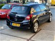 Opel Corsa - 1.4-16V Sport - 1 - Thumbnail