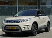 Suzuki Vitara - 1.6 EXCLUSIVE NAVI CLIMA CRUISE 18 INCH LMV NL-AUTO - 1 - Thumbnail