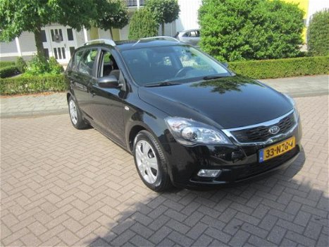 Kia Cee'd Sporty Wagon - 1.4 CVVT X-ecutive - 1