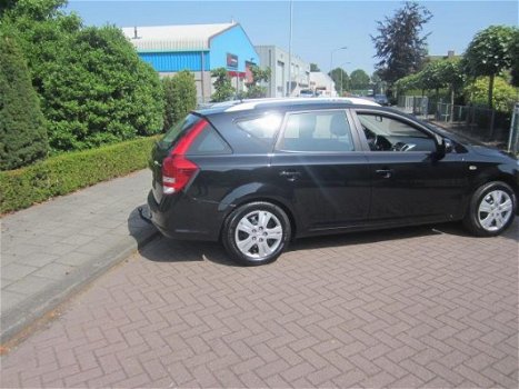 Kia Cee'd Sporty Wagon - 1.4 CVVT X-ecutive - 1