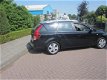 Kia Cee'd Sporty Wagon - 1.4 CVVT X-ecutive - 1 - Thumbnail