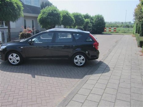 Kia Cee'd Sporty Wagon - 1.4 CVVT X-ecutive - 1