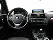 BMW 1-serie - 114I SPORT LINE + LEDER / SPORTSTOELEN / NAVI PRO / XENON - 1 - Thumbnail