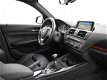 BMW 1-serie - 114I SPORT LINE + LEDER / SPORTSTOELEN / NAVI PRO / XENON - 1 - Thumbnail