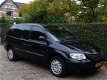 Chrysler Voyager - 2.4i LX 7-Pers., 2e Eig., Full Options, Navi, ECC, Cruise, etc. - 1 - Thumbnail