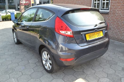 Ford Fiesta - 1.25 Titanium 1e eigenaar 2009 87.000 km abs airco stoelverwarming velgen radio cd ele - 1