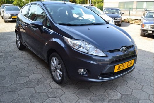 Ford Fiesta - 1.25 Titanium 1e eigenaar 2009 87.000 km abs airco stoelverwarming velgen radio cd ele - 1