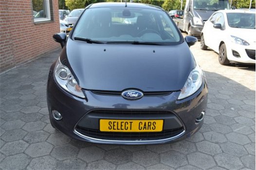 Ford Fiesta - 1.25 Titanium 1e eigenaar 2009 87.000 km abs airco stoelverwarming velgen radio cd ele - 1