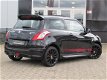 Suzuki Swift - 1.2 X-ITE SCHUIFDAK|CRUISE CONTROL|KEY LESSGO & ENTRY|ECC/AIRCO|LM-VELGEN|DEALER ONDE - 1 - Thumbnail